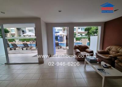 Living area with pool view