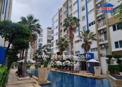 Outdoor view of a residential building with a swimming pool