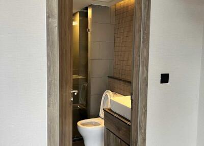 Modern bathroom with wooden accents