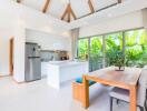 Modern kitchen and dining area with natural light