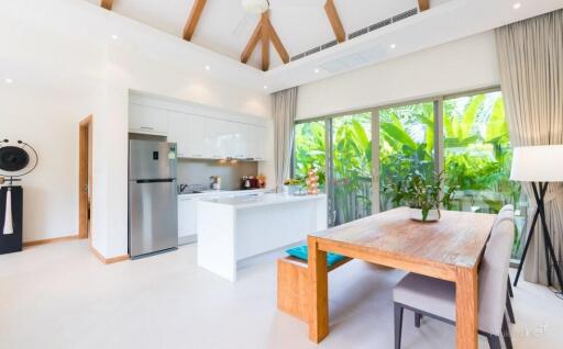 Modern kitchen and dining area with natural light