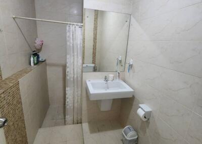 Modern bathroom with a shower area and sink