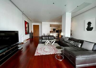 Spacious modern living room with hardwood floors and contemporary decor