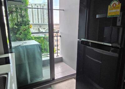 Modern kitchen with balcony view