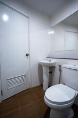 Modern clean bathroom with white fixtures