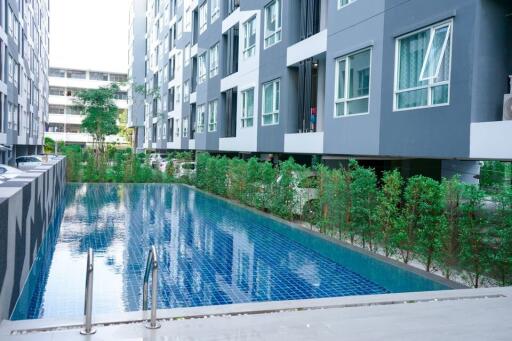 Modern apartment buildings with a swimming pool