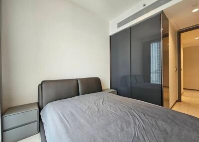 Modern bedroom with bed and wardrobe