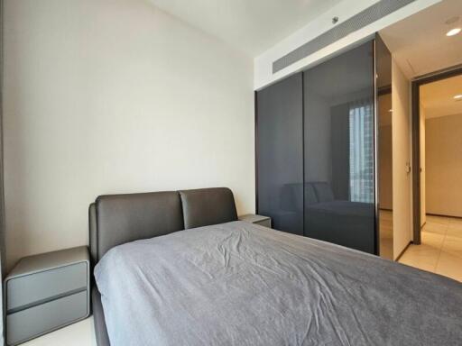 Modern bedroom with bed and wardrobe