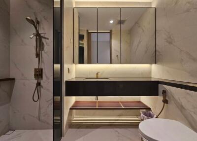 Modern bathroom with integrated shower and vanity mirror