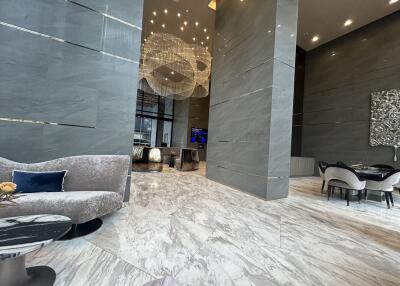 Modern lobby area with luxurious furnishings and decor