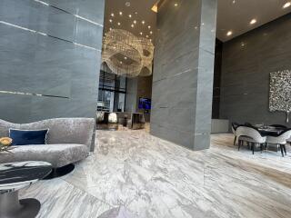 Modern lobby area with luxurious furnishings and decor