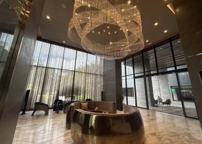 Luxurious lobby with chandelier and modern seating area