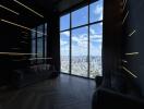 Living room with large floor-to-ceiling windows offering city view