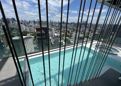 Rooftop pool with a city skyline view