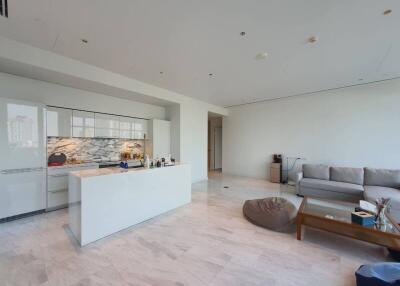 Spacious living area with kitchen island and modern furnishings