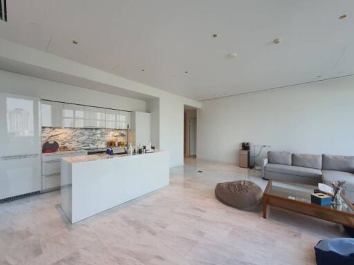 Spacious living area with kitchen island and modern furnishings