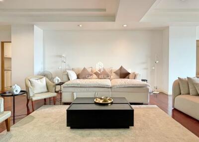 Spacious modern living room with comfortable seating and elegant decor