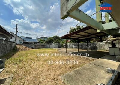 Backyard area with covered structure