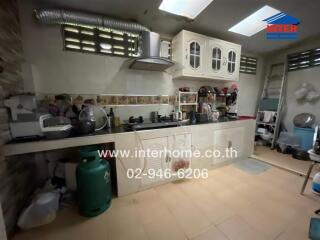 Spacious kitchen with modern appliances and ample storage