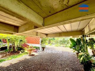 Covered outdoor area with garden view