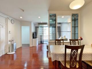 Living area with dining table, open layout, and modern decor