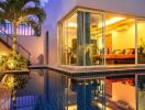 Modern pool area with outdoor seating and large glass windows