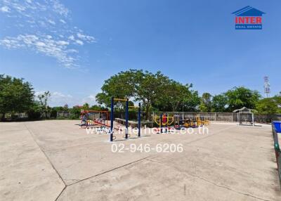 Spacious outdoor playground with equipment