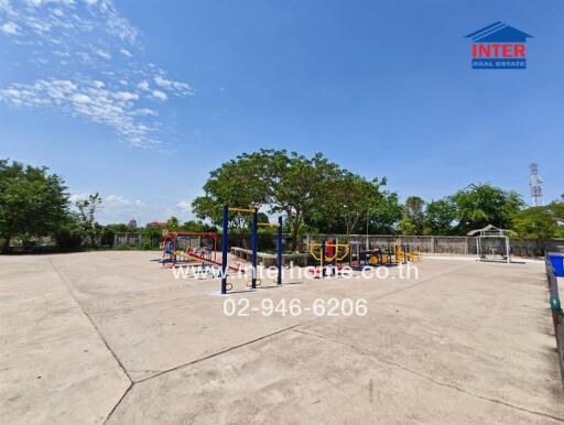 Spacious outdoor playground with equipment