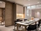 Modern dining area adjacent to the bedroom with a sleek design.