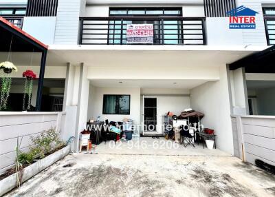 Exterior view of a residential building with a garage