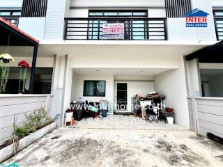 Exterior view of a residential building with a garage