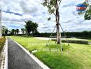 Outdoor landscaped garden with walking path and trees