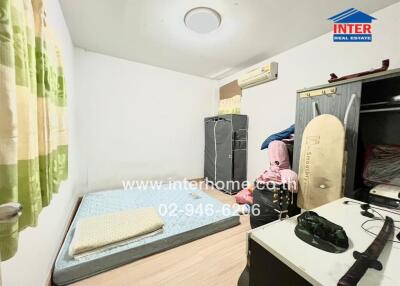 Bedroom with minimalist furnishings and natural light