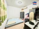 Bedroom with minimalist furnishings and natural light