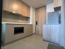 Modern kitchen with wooden cabinets and appliances