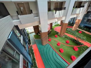 Atrium view with seating area and greenery