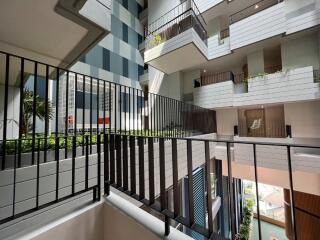 Modern building interior with multiple floors and railings