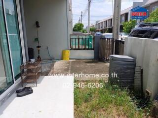 Outdoor space with grass and concrete patio