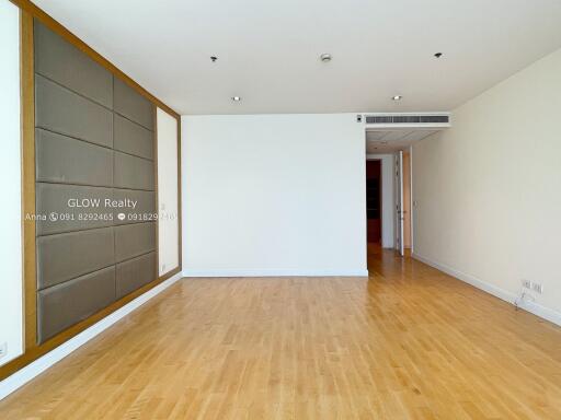 Spacious living room with wooden flooring and modern decor