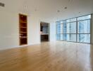 Spacious living area with large windows and natural light