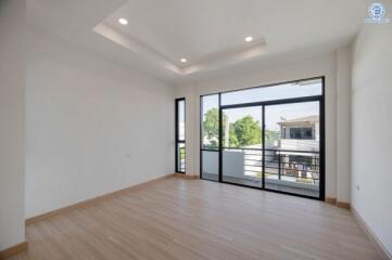 Spacious living room with large windows