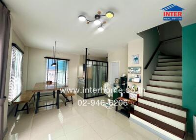 Modern dining area with staircase