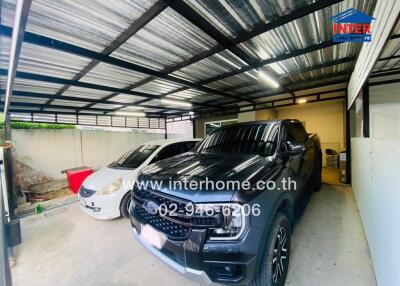 Spacious modern garage with parked cars