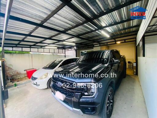 Spacious modern garage with parked cars