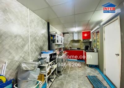 Modern kitchen with various appliances and storage spaces
