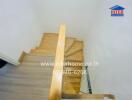 Wooden staircase with guard rail