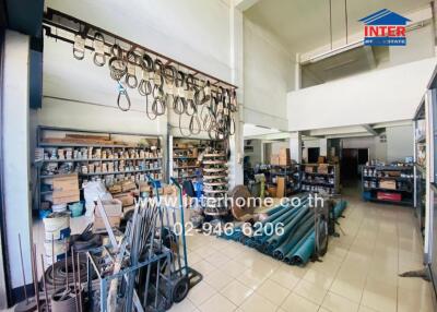 Spacious workshop with tools and materials neatly organized on shelves