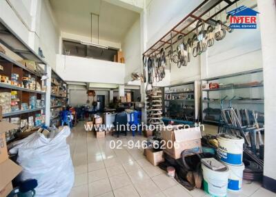 Warehouse or storage area with shelves and various items