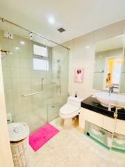 Modern bathroom with glass shower and vanity