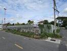 Exterior view of a fenced building lot